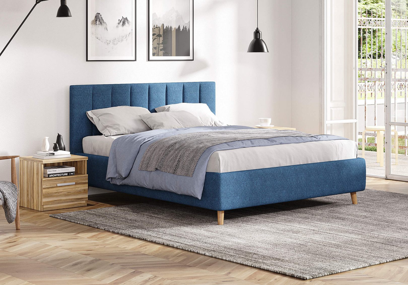 Кровать в синей обивке и деревянными ножками